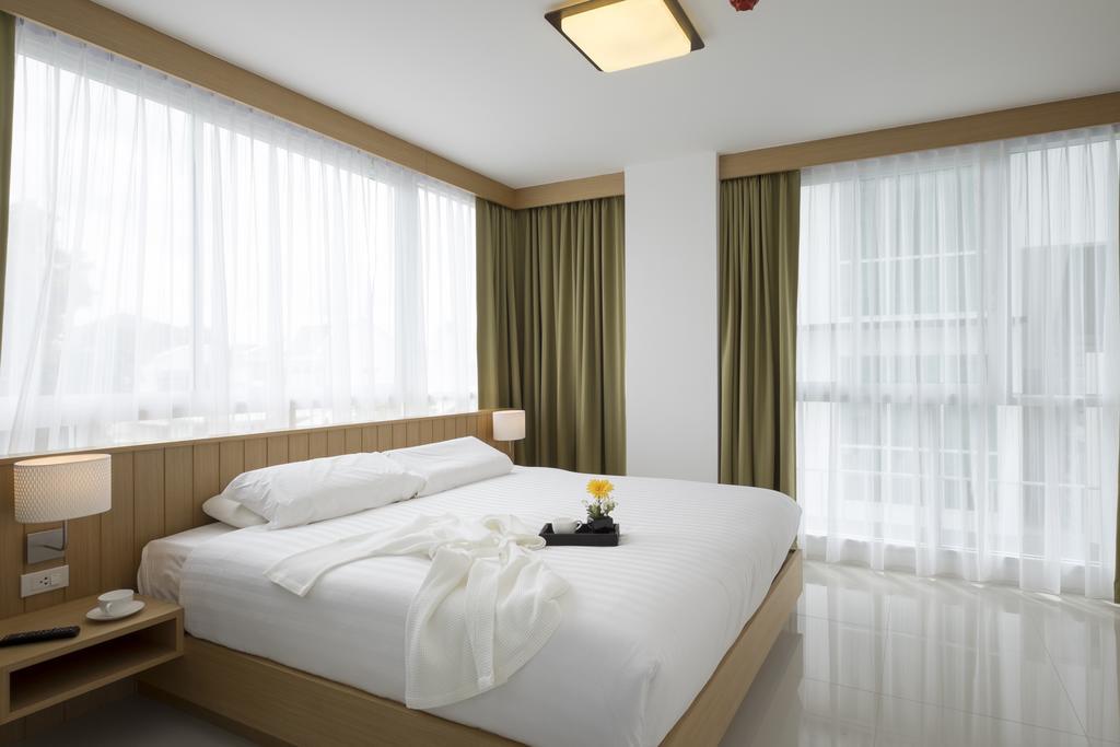 Modern Thai Suites Пхукет Номер фото